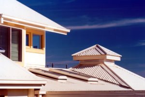 Rooftops and solar chimney, ecohome, Sunbury. Designed by Bridget Puszka, Senior Design Architect, BP Architects Rooftops and solar chimney, ecohome, Sunbury. Designed by Bridget Puszka BP Architects