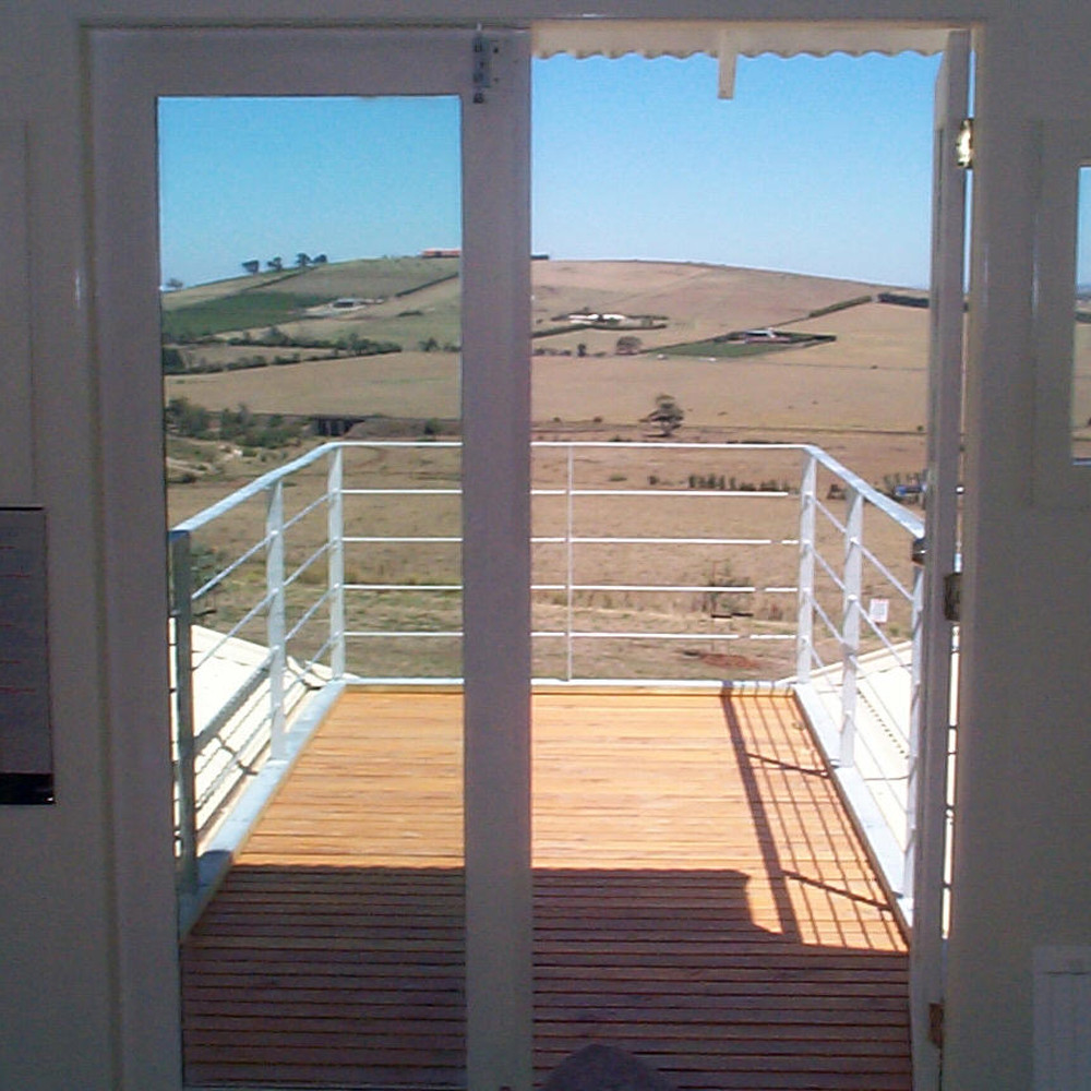 View from the home office, ecohome, designed by BP Architects. Reduce your business ecological footprint Office views of surrounding Sunbury hills, sustainable ecohome designed by BP Architects
